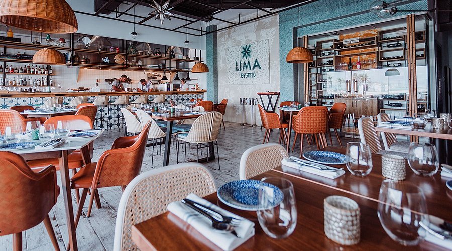 Lima Bistro interior with open kitchen and marina views